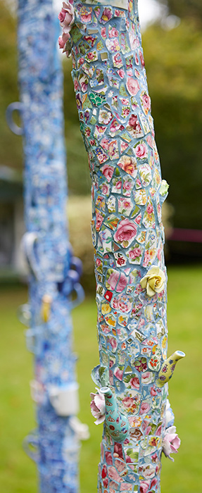 Totems with ceramic flower fragments